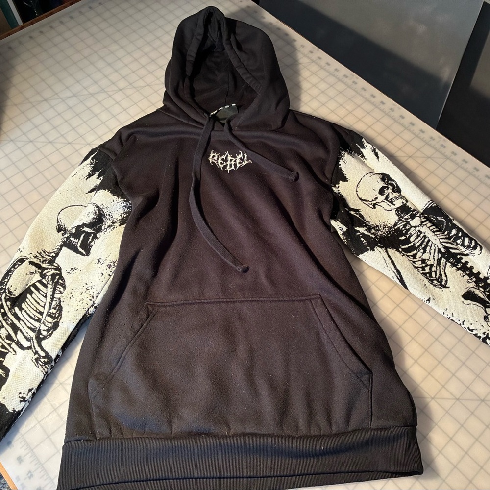 rebels Black Hoodie with Off-White Skeleton Sleeve Graphics